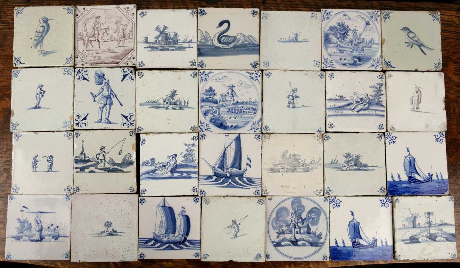 Collection of Delft tiles Dutch, blue and white, depicting various subjects, including two Manganese