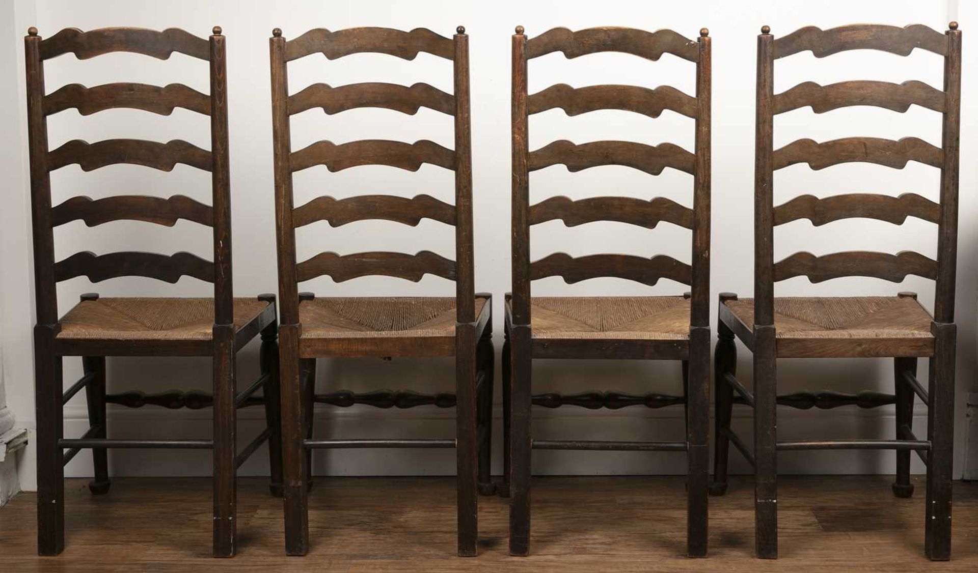 Set of four stained beech ladder back dining chairs with rush seats, 44cm wide x 41cm deep x 105cm - Image 2 of 2