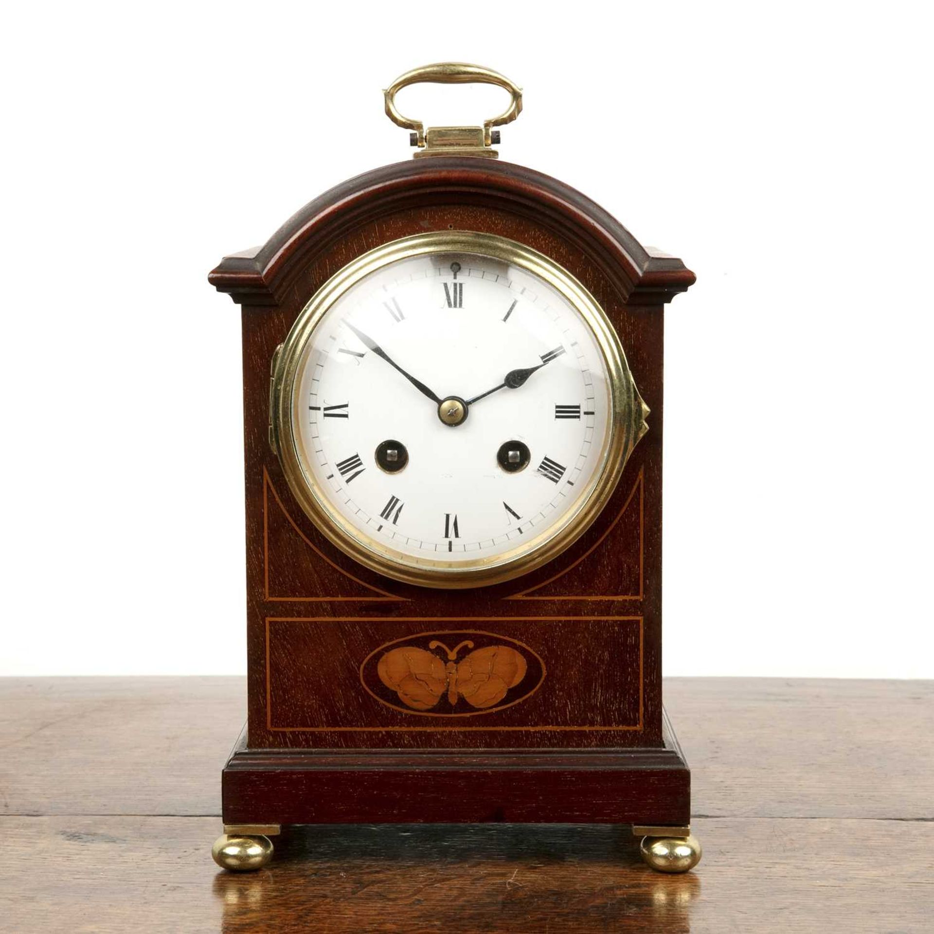Mahogany and inlaid mantel clock Edwardian, with a striking movement, 25cm high Provenance: The