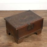Oak box on stand late 17th/early 18th Century, with carved decoration to the top amd iron lock