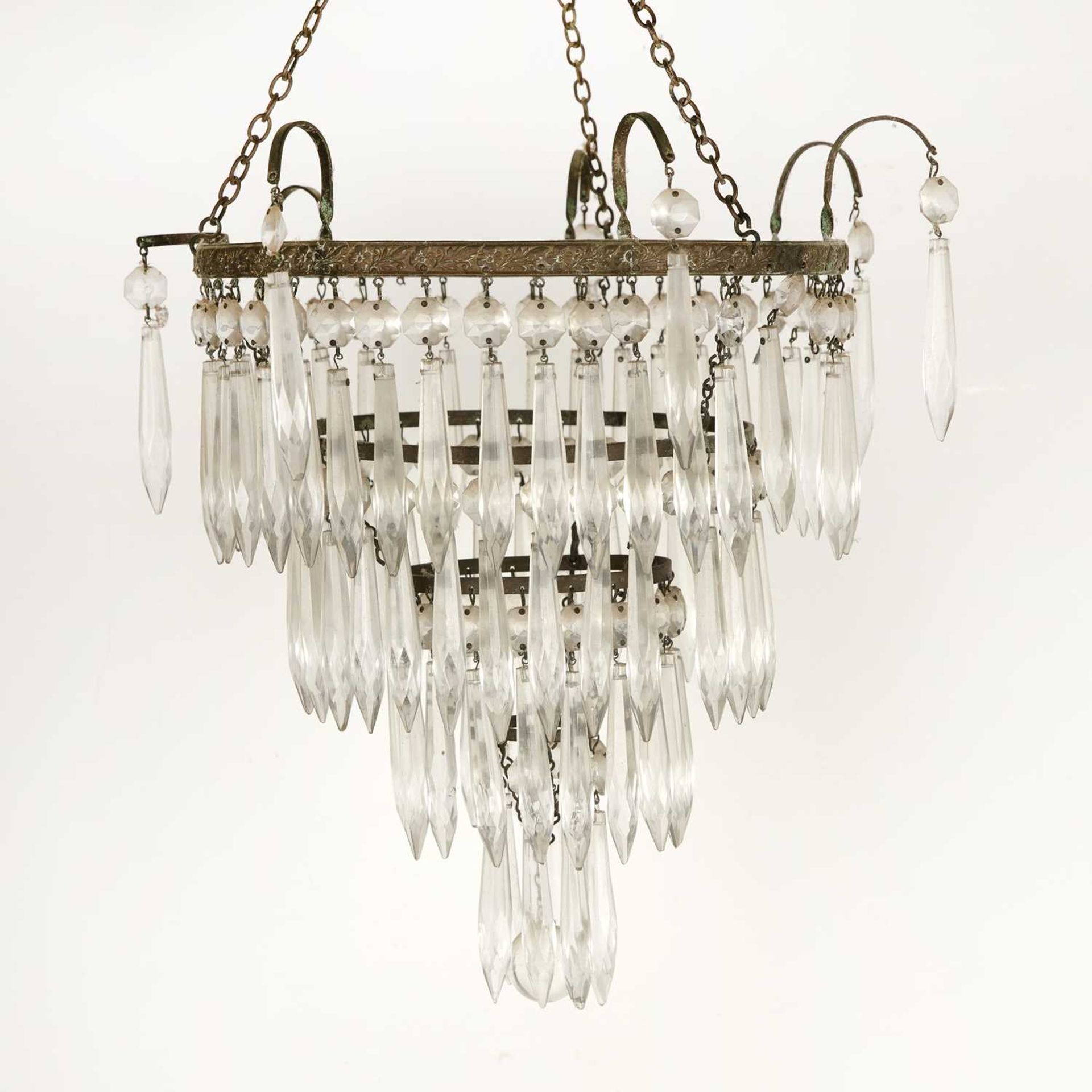 Continental gilt metal and cut glass chandelier 20th Century, decorated with flowers to the gilt