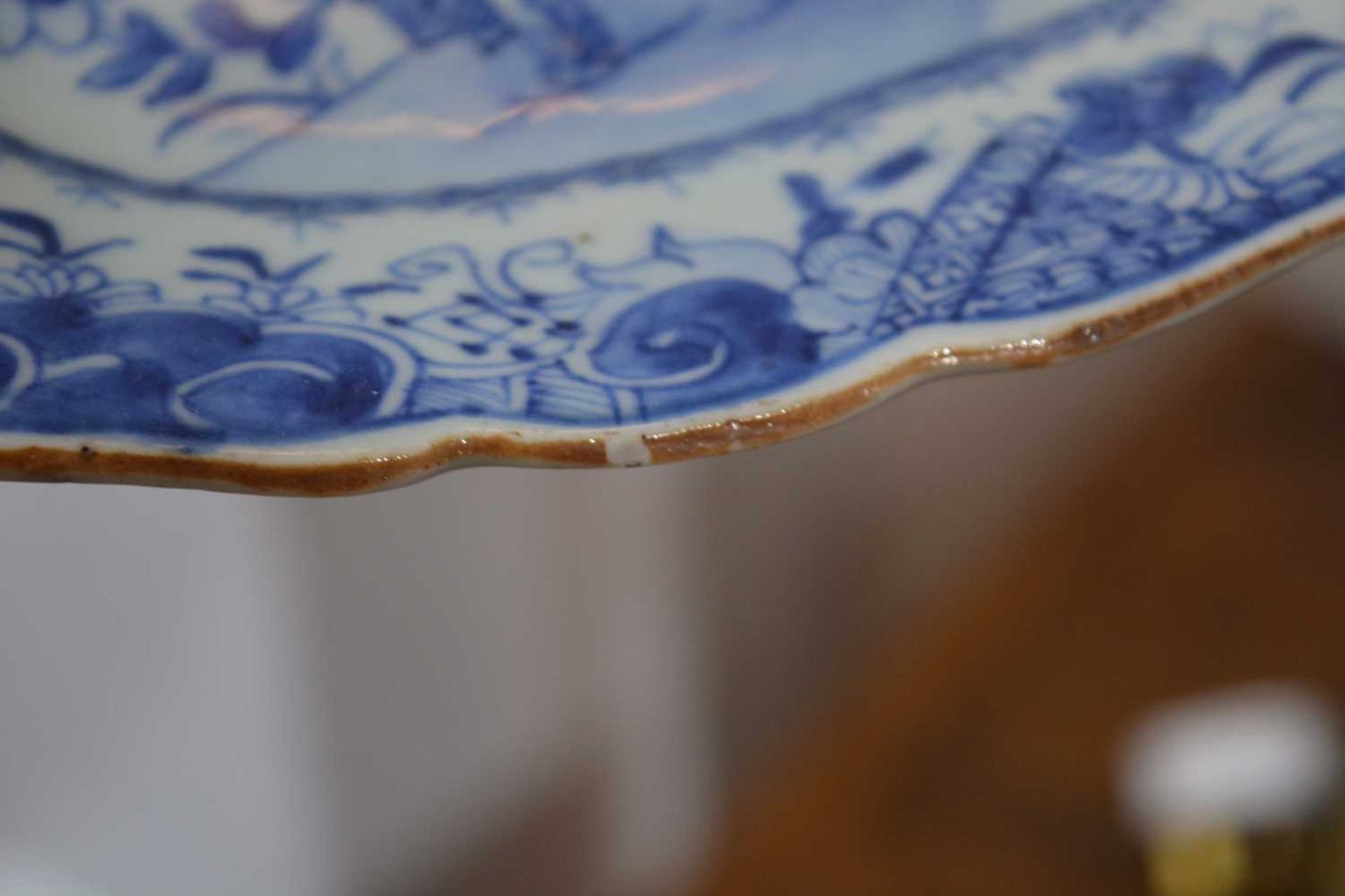 Three blue and white export dishes Chinese, circa 1800, the largest meat plate with tree and - Image 9 of 15