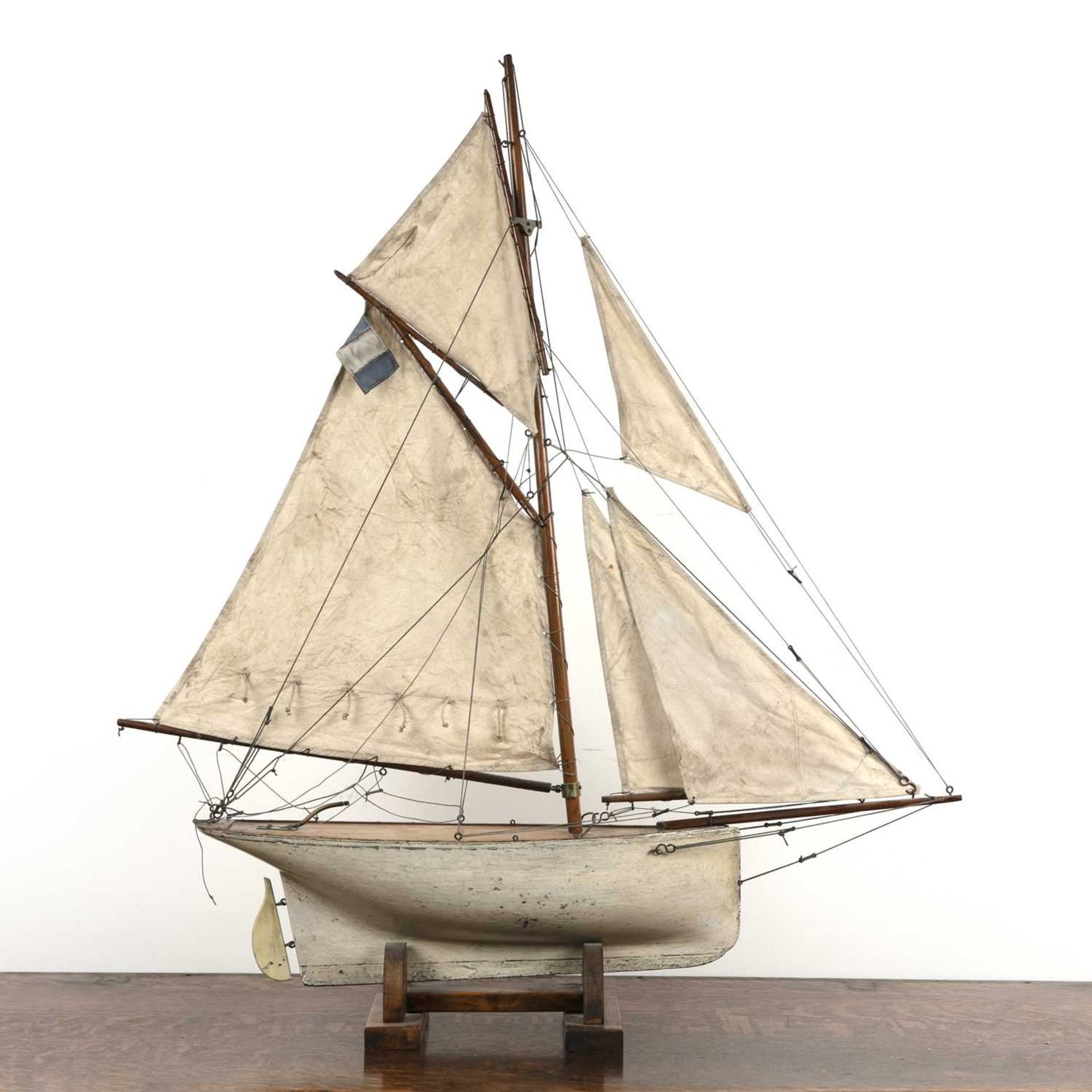 Large scratch built pond yacht on stand 20th Century, painted white hull with linen sails, 98.5cm - Image 2 of 2