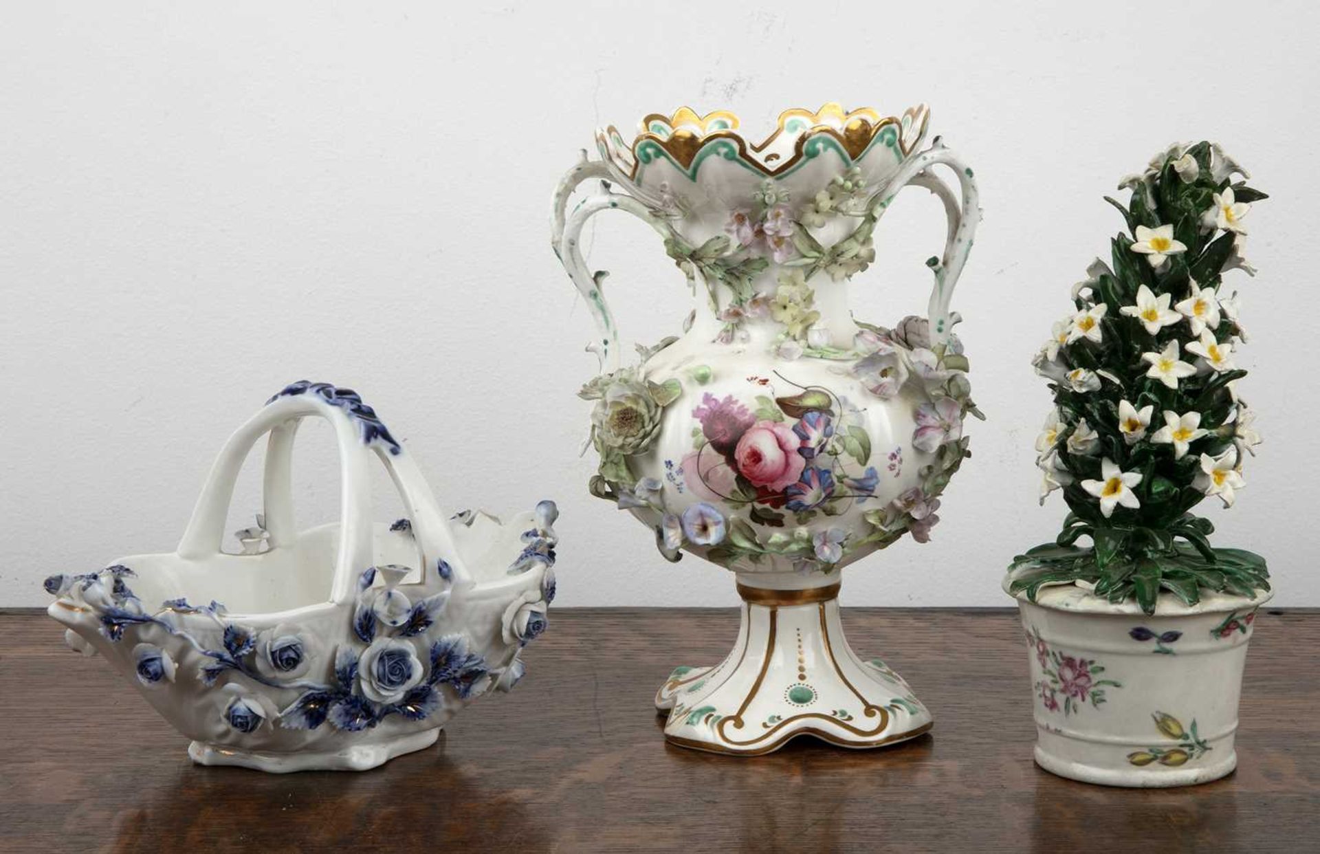 Three porcelain pieces including a Bow porcelain model vase of flowers, 19cm high, a Helena Wolfsohn - Image 2 of 3