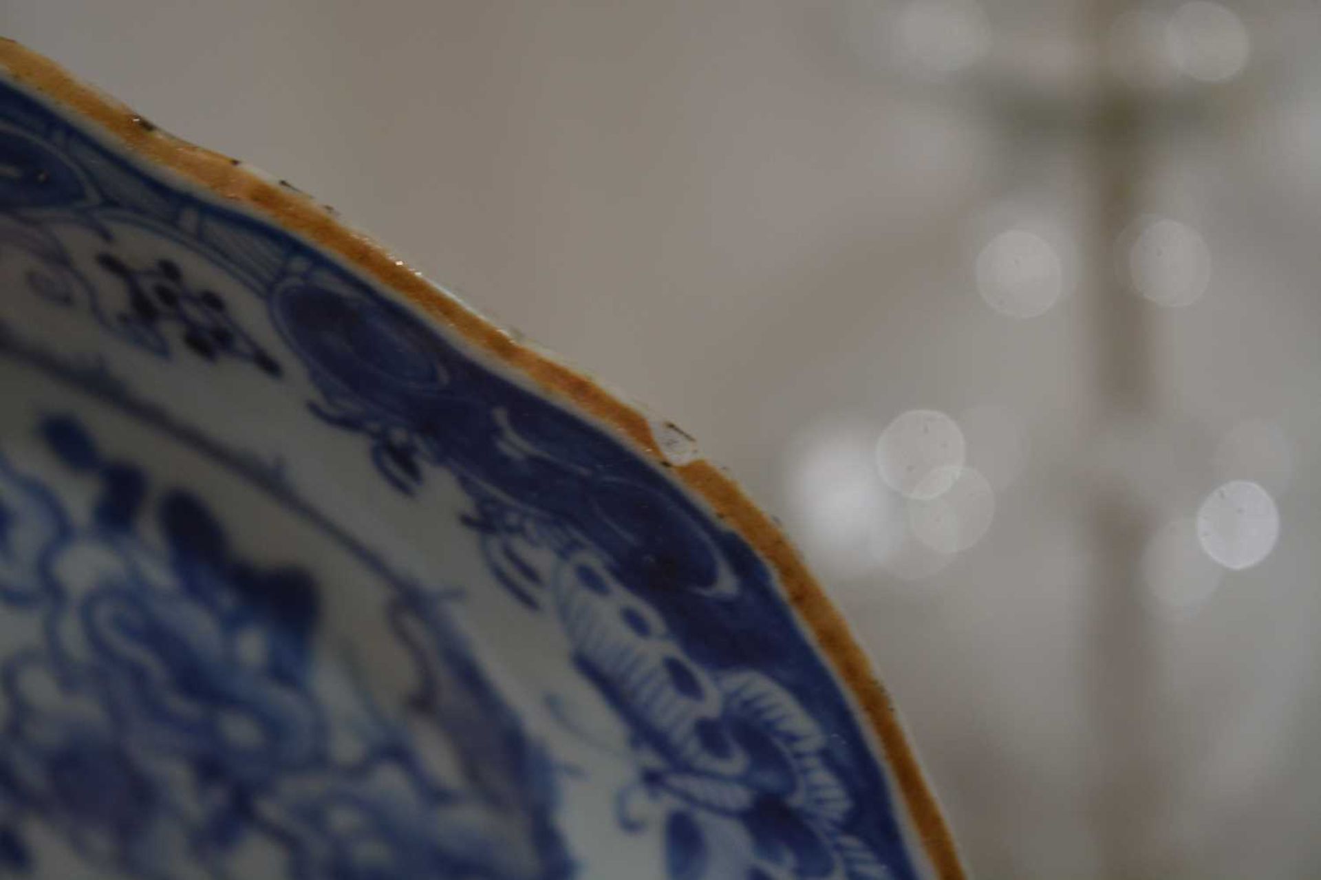 Three blue and white export dishes Chinese, circa 1800, the largest meat plate with tree and - Image 4 of 15