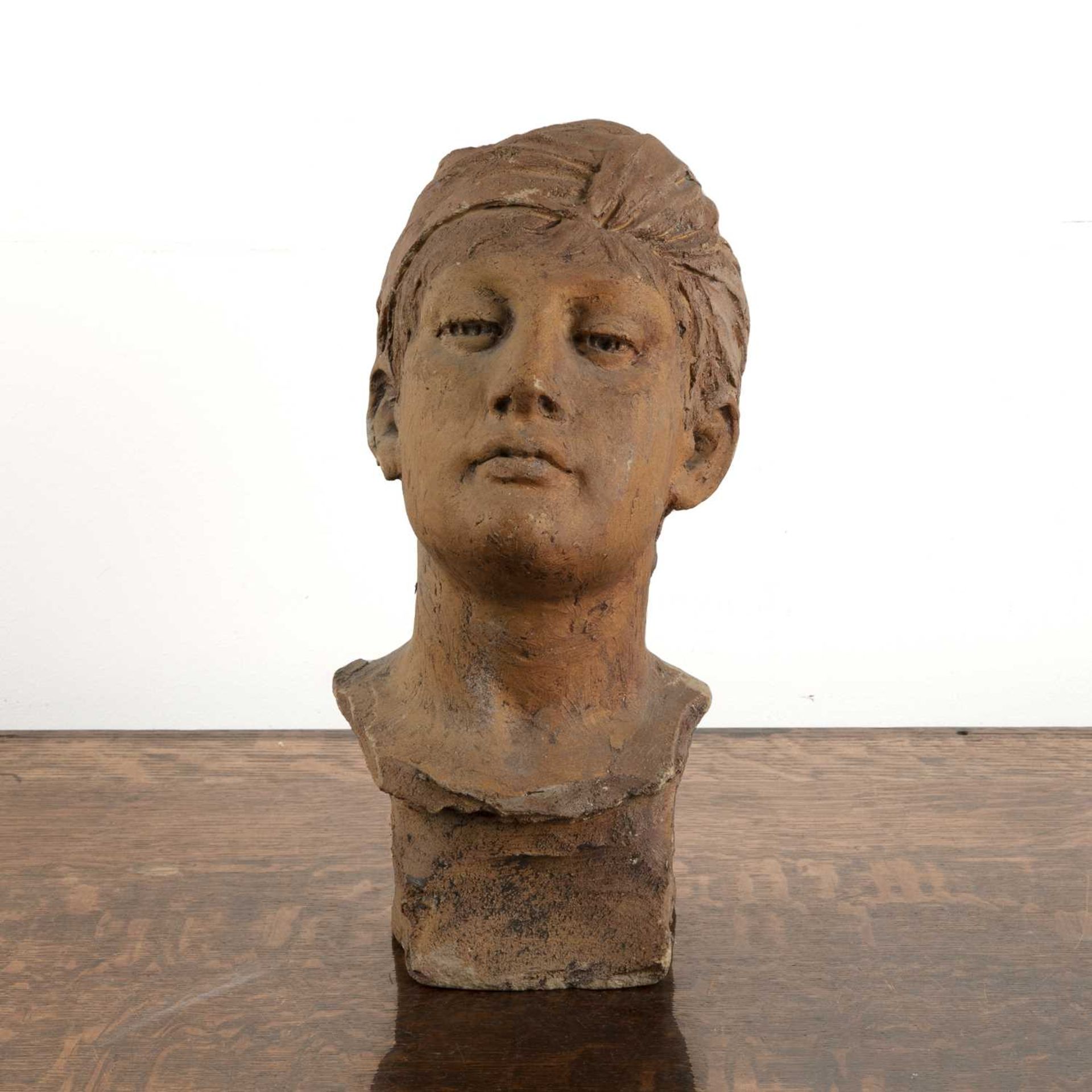 Plaster head of a girl French, circa 1900, impressed signature, 34cm high Provenance: The property