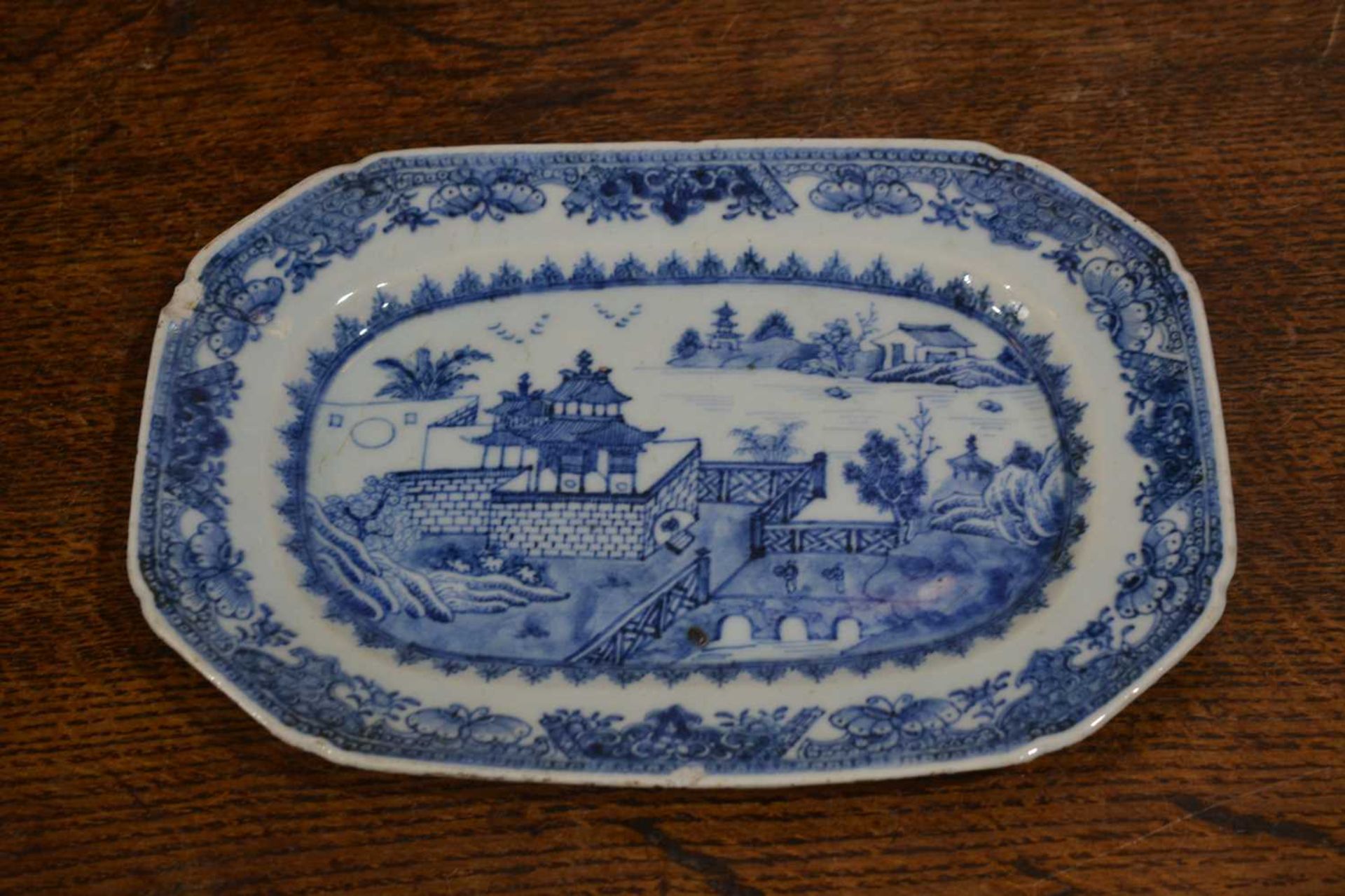 Three blue and white export dishes Chinese, circa 1800, the largest meat plate with tree and - Image 7 of 15