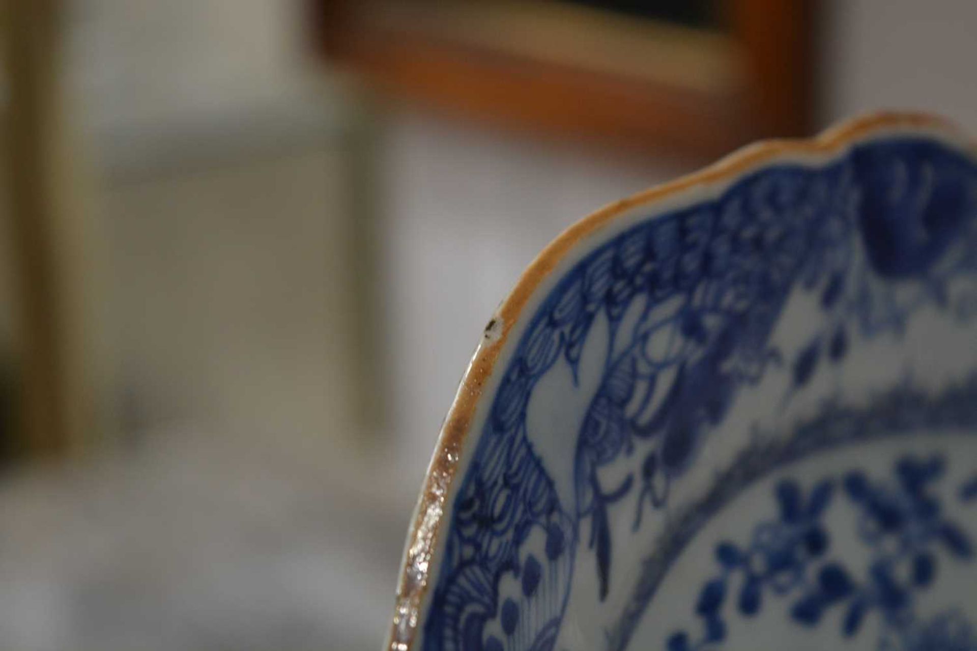 Three blue and white export dishes Chinese, circa 1800, the largest meat plate with tree and - Image 10 of 15