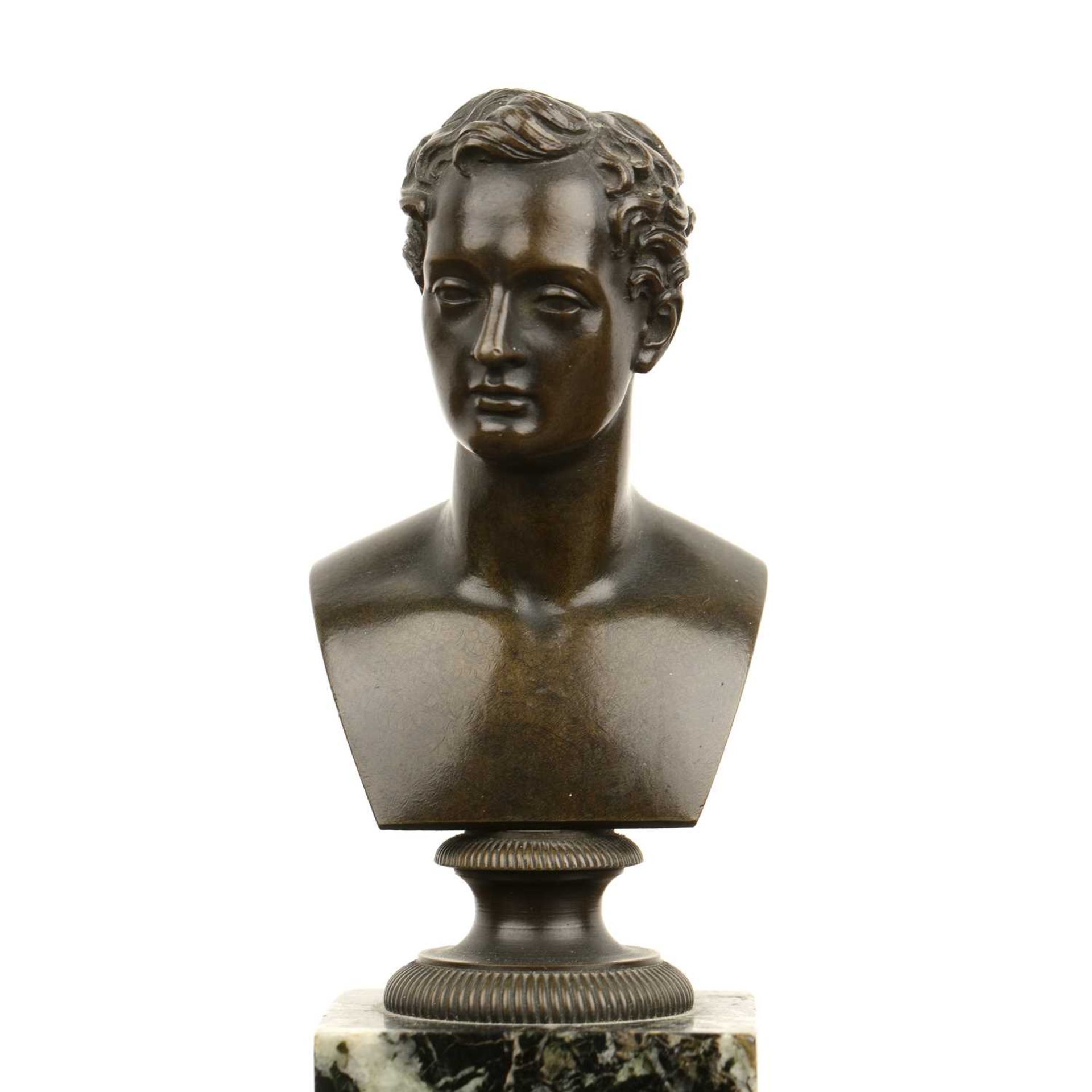 19th Century English School bronze bust of a male, on a green marble stepped plinth, 17cm high