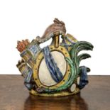 Maiolica armorial table centrepiece Spanish, with oval cartouche, quivers, and foliate decoration,