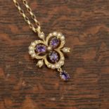 9ct gold amethyst and pearl pendant with additional brooch fitting to the reverse, on an