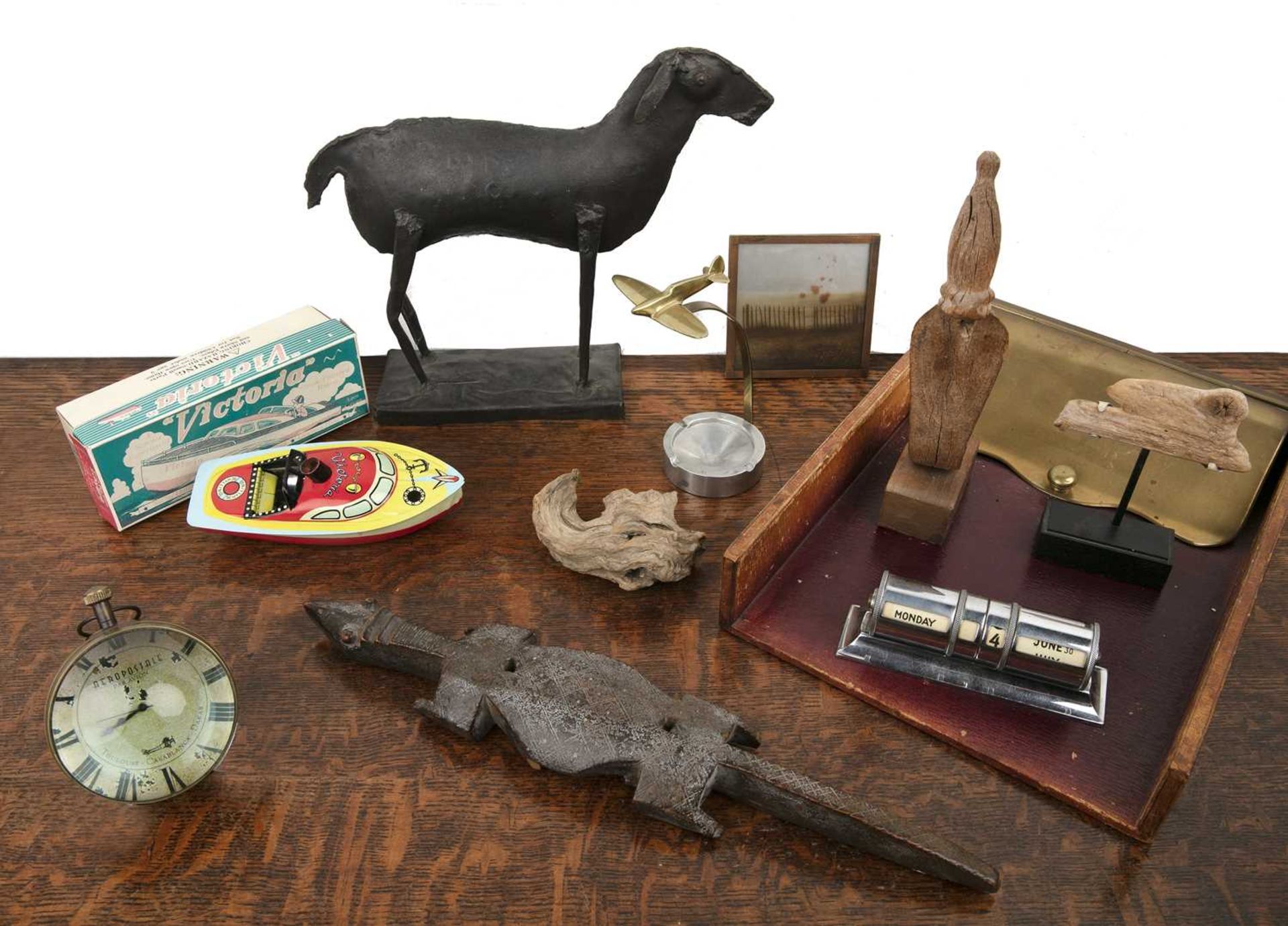 Group of desk top related pieces to include an Aerostale desk clock and other items. Provenance: The