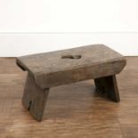 Oak rustic country stool early 19th Century, with cut-out handle top, of rectangular form, 43cm wide