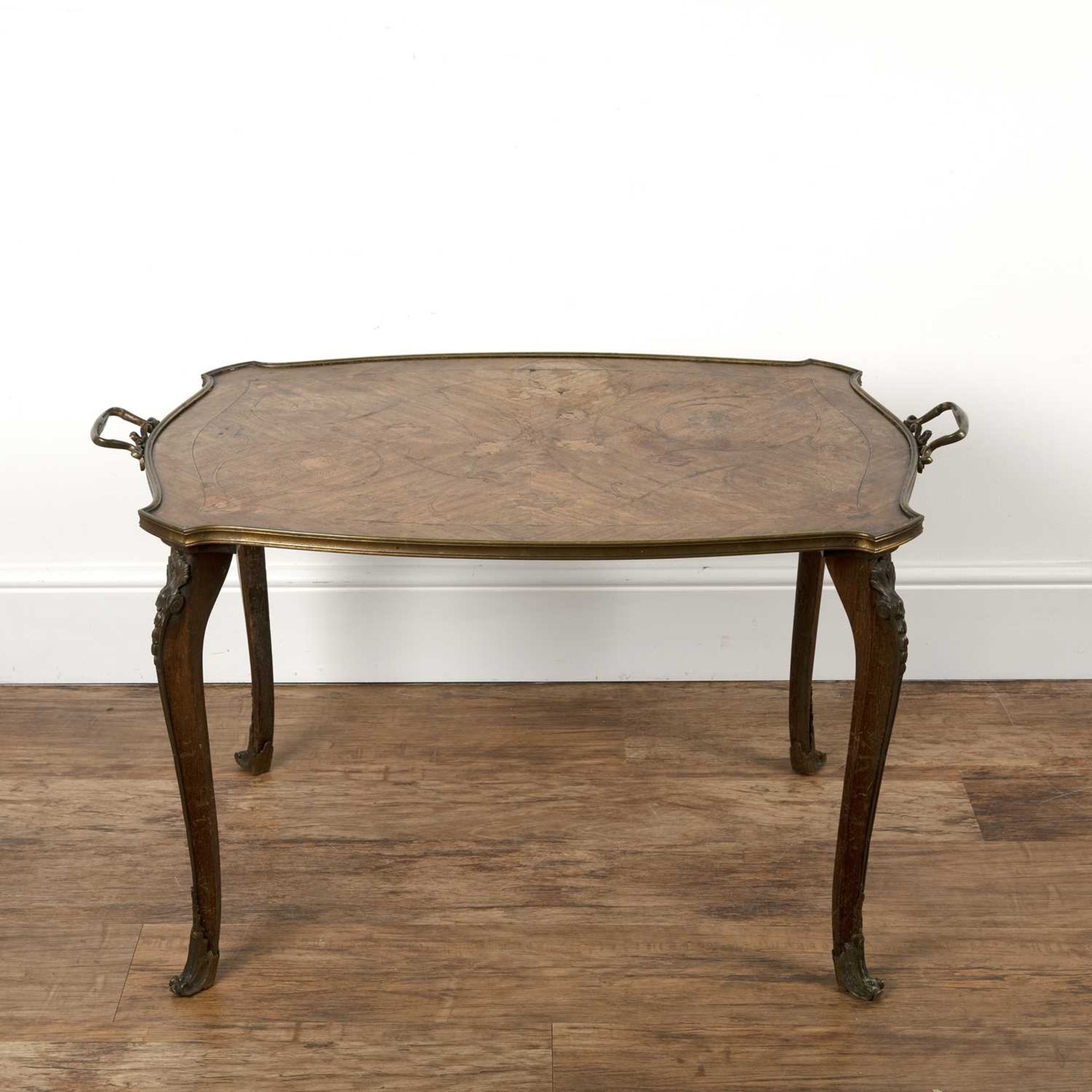 Marquetry and gilt metal low table French, the shaped top with carrying handles, 92cm long x 56cm