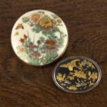 Two brooches Japanese, comprising of: a shakudo mounted oval brooch, 3.5cm, and a Satsuma mounted