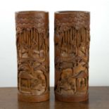 Pair of bamboo carved brush pots Chinese, with temple and scholars set within pine trees, 31cm