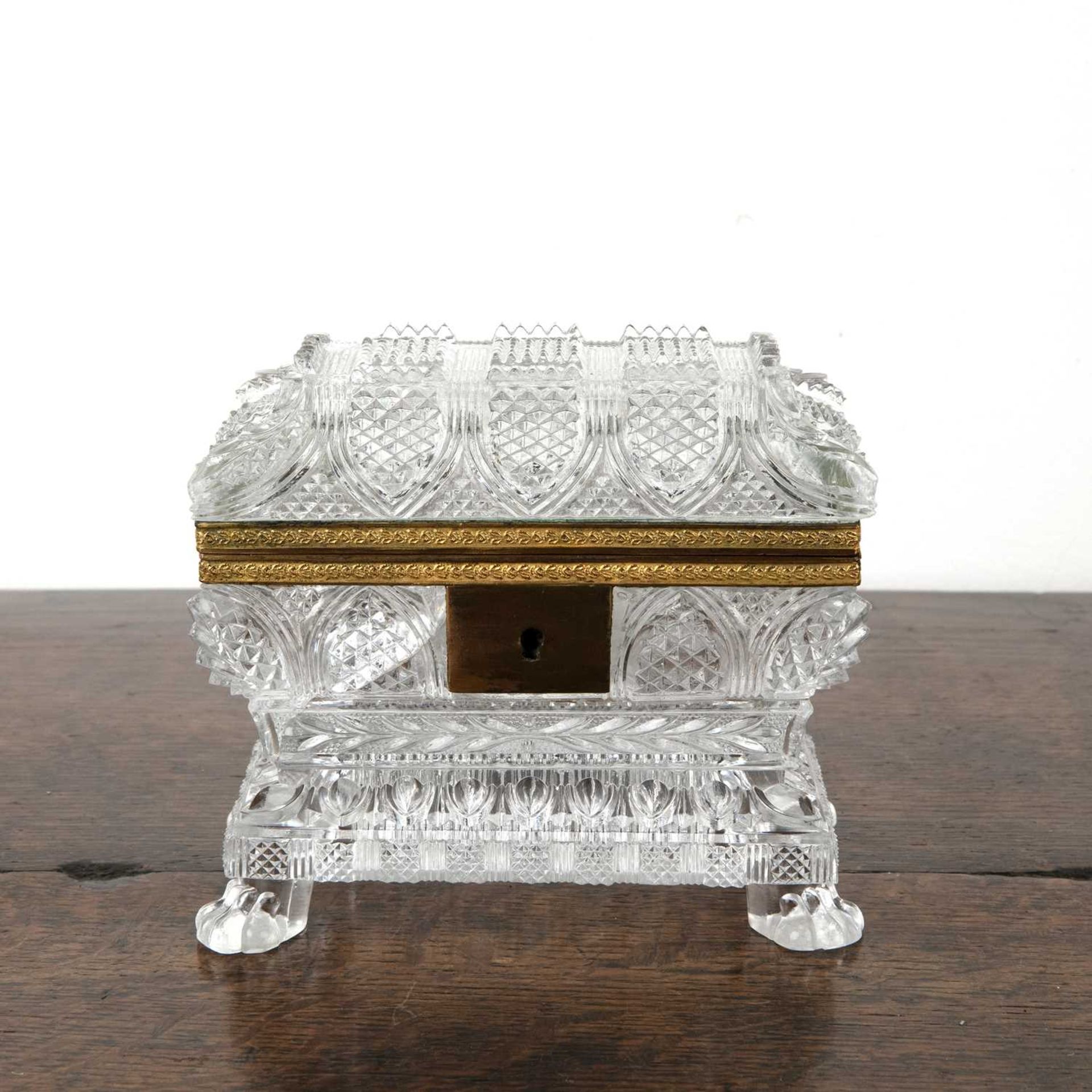 French Charles X style glass casket or coffin with gilt metal mounts on a pressed or moulded glass