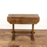 Yorkshire school Oak, drop leaf table with adzed top, on a pegged construction base, carved