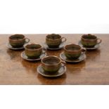 Set of six teacups and saucers Studio pottery, with iron glaze, unmarked, saucer 13.5cm across,