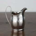 George III silver cream jug With bright cut decoration, bearing marks for London, 1799, 12cm high