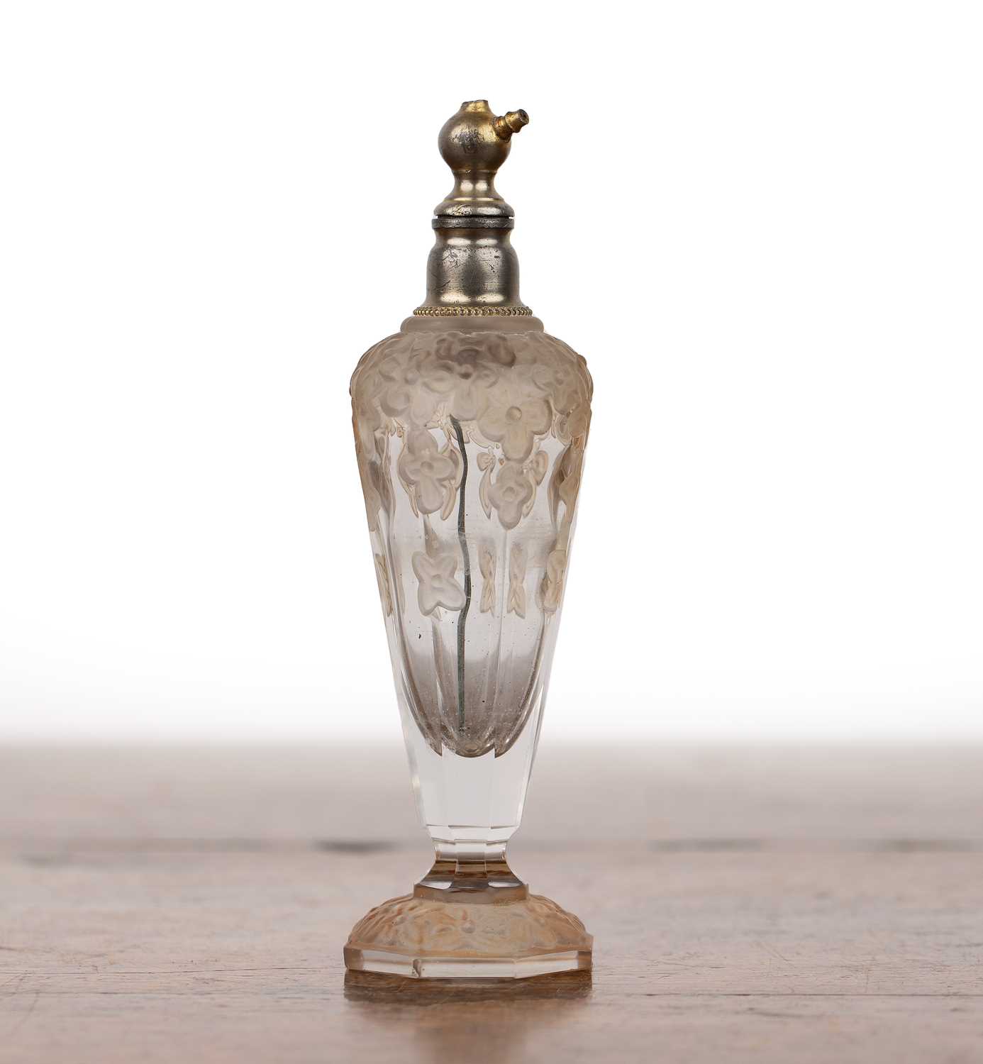 Art Deco glass scent or perfume bottle French, with moulded decoration of trailing flowers, with