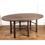 In the manner of Philip Speakman Webb (1831-1915) Probably walnut, large oval topped table with