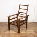 Ambrose Heal (1872-1959) for Heals Oak, Arts and Crafts armchair, 100cm high when in furthest back