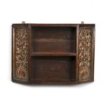 In the manner of The Guild of Handicraft Arts and Crafts, small oak shelf, fitted with two copper
