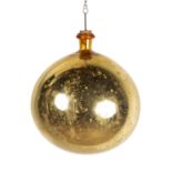 Large witches or apothecary ball Early 20th Century, gold coloured glass, with a metal chain,
