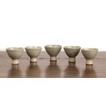 Leach pottery (St. Ives) Five studio pottery standard ware stem wine cups, with celadon glaze,