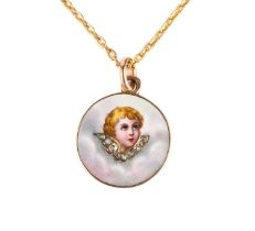 A late 19th/early 20th century enamel and diamond pendant, decorated with the profile of a cherub