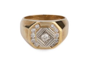 A diamond set panel ring, the octagonal panel centred with an old brilliant-cut diamond in reeded