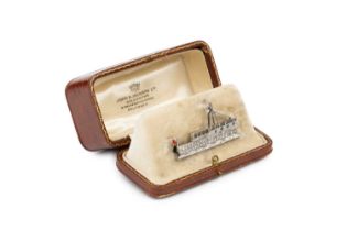 Of maritime interest: A diamond and enamel panel brooch, modelled as a passenger ship, with single-