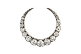 A late 19th/early 20th century diamond crescent brooch/pendant, designed as a row of graduated old