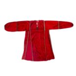 Red silk velvet kurta South Asia, with a part cotton printed lining Provenance: The Olivia Dell