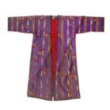 Sprigged purple silk coat Tadjik, with Russian print lining and ikat reveres and cuffs.