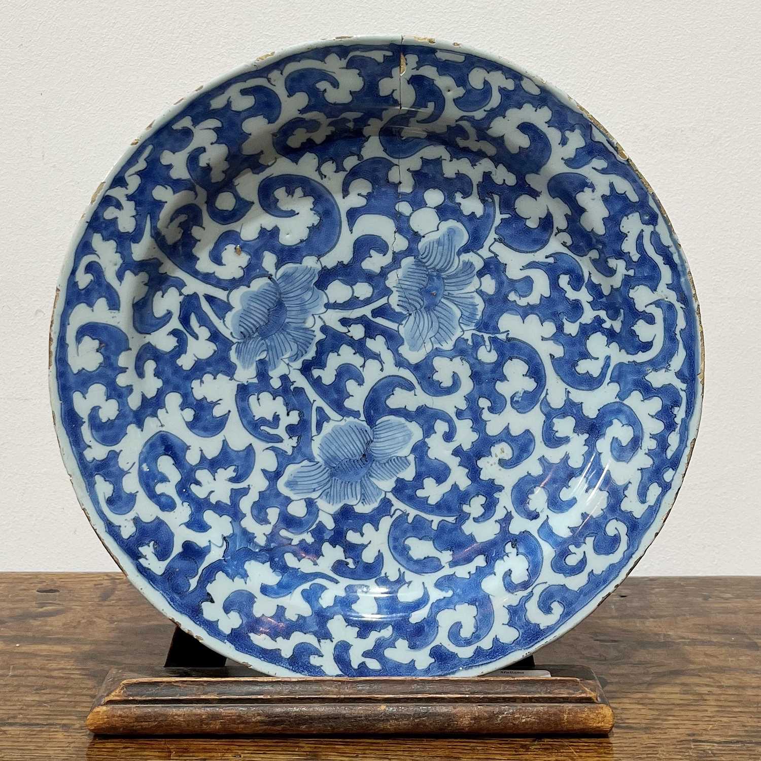 Delft blue and white plate in the Chinese style Dutch, 18th Century, painted in the Kangxi manner