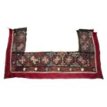 Bed hanging Kyrghyz, of black ground with typical woven designs, 230cm x 125cm Provenance: The