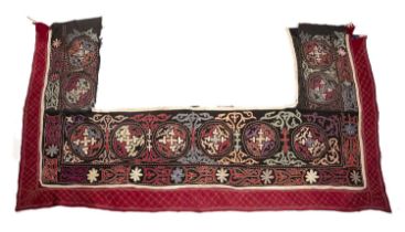 Bed hanging Kyrghyz, of black ground with typical woven designs, 230cm x 125cm Provenance: The