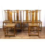 Set of six provincial elm dining chairs Chinese, with carved back rails and rattan seats, 108cm high