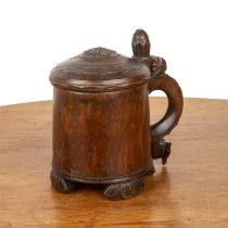 Norwegian birch pressed tankard mid 18th Century, decorated with a flower to the top lid and a