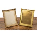 Matched pair of French gilt metal photo frames late 19th/early 20th Century, with scrolling
