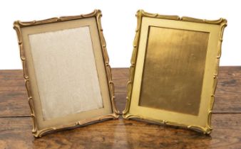 Matched pair of French gilt metal photo frames late 19th/early 20th Century, with scrolling