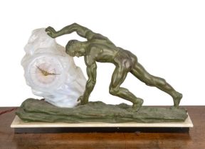 Art Deco style clock bronzed spelter and resin on a marble base, modelled as Sisyphus, 64cm wide x