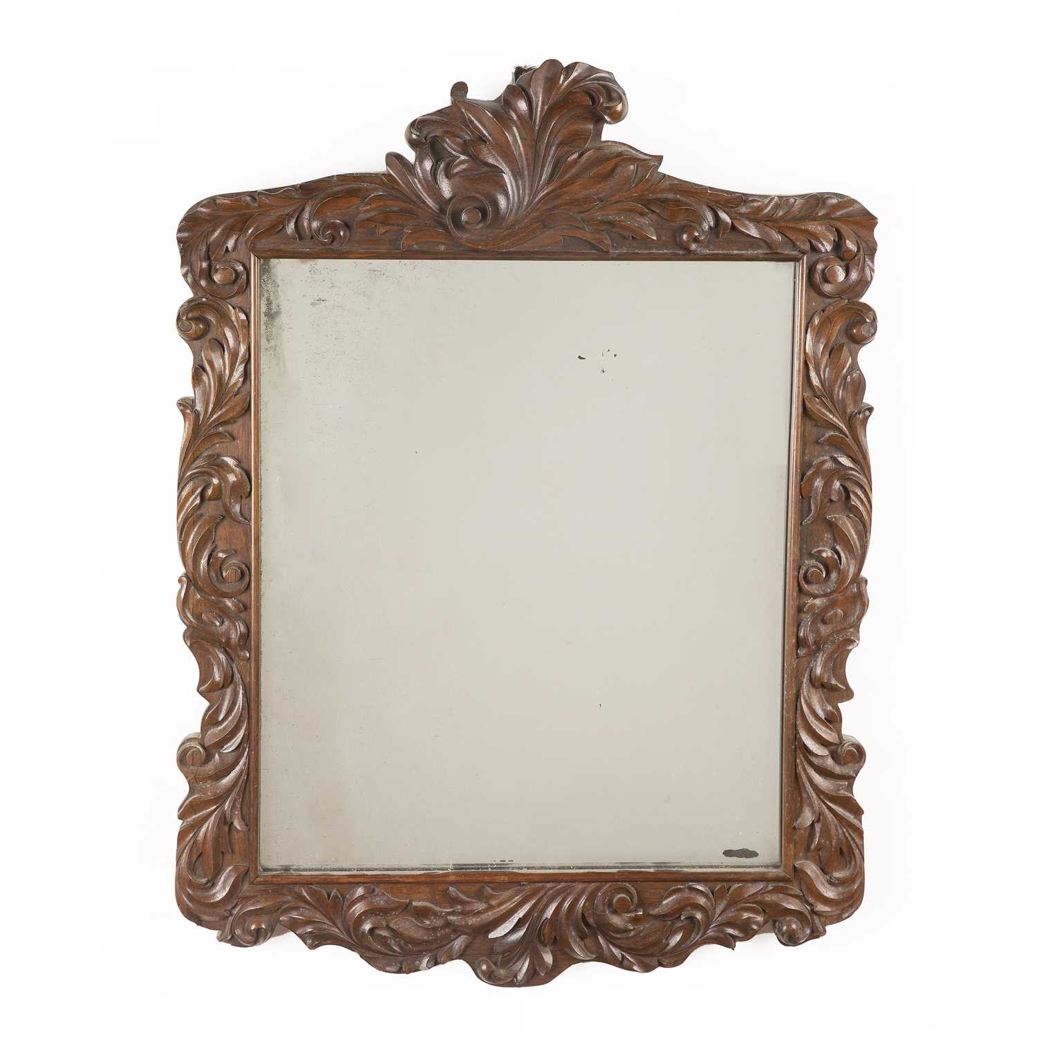 Carved oak framed mirror with scrolling foliate decoration, 80cm x 59.5cm Provenance: The Property