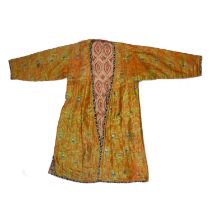 Silk and woven coat Turkmenistan, with icat edging and printed cotton lining and a further striped