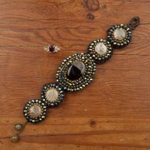 Selection of jewellery comprising: a woven hairwork panel bracelet with agate and beads applied to