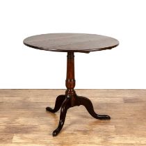 Oak tripod table 18th Century, with circular top, 74cm wide overall x 69cm high Possibly once a tilt