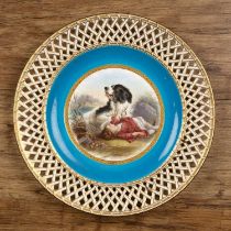 Minton porcelain cabinet plate English, 19th Century, painted with a St Bernard and a child,