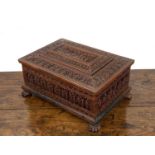 Sandalwood jewel box Indian, late 19th/20th Century, with extensive carved decoration throughout and